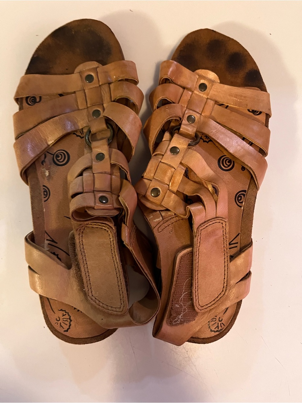 Well loved woman’s sandals size 8
